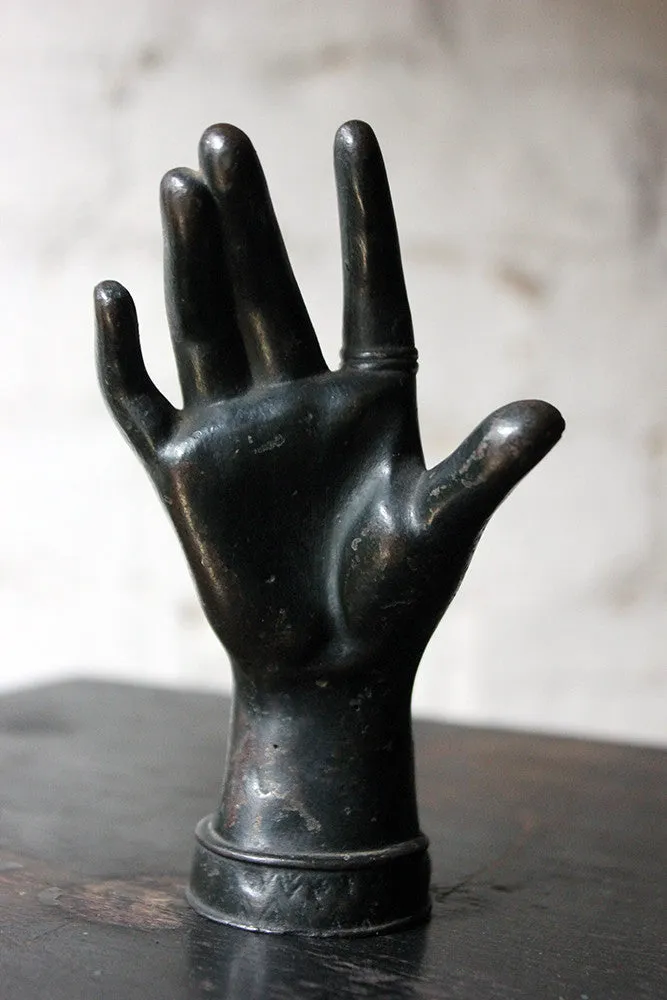 A Good Quality Victorian Dark Patinated Cast Iron Paperweight in the Form of a Ladies Hand c.1870-80