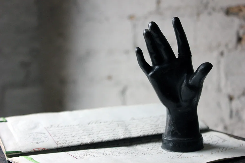 A Good Quality Victorian Dark Patinated Cast Iron Paperweight in the Form of a Ladies Hand c.1870-80