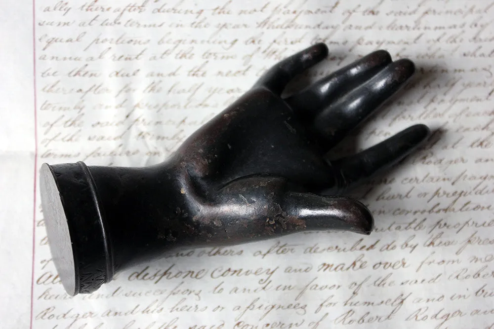 A Good Quality Victorian Dark Patinated Cast Iron Paperweight in the Form of a Ladies Hand c.1870-80