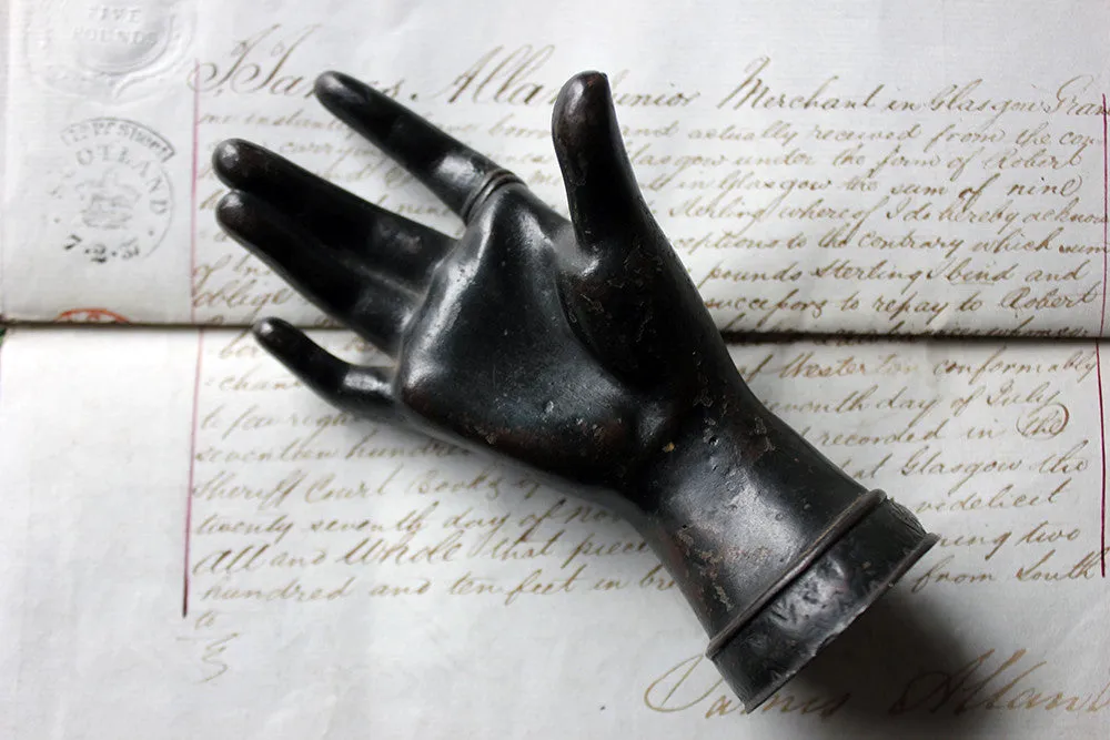 A Good Quality Victorian Dark Patinated Cast Iron Paperweight in the Form of a Ladies Hand c.1870-80