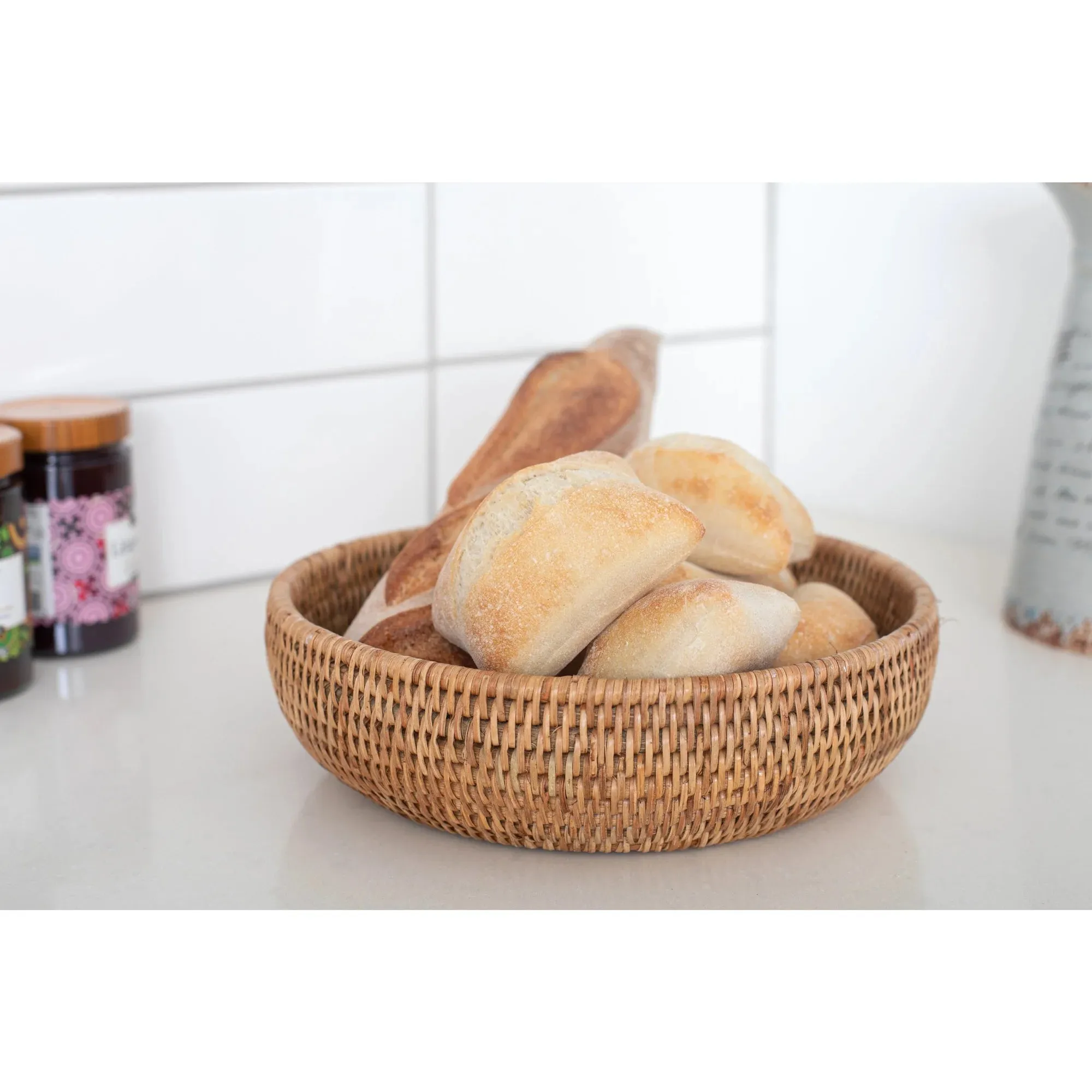 Woven rattan shallow round basket